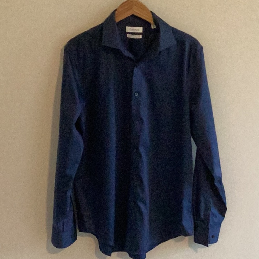 Calvin Klein men’s infinite wrinkle free blue dress shirt. Worn once. Cleaned.